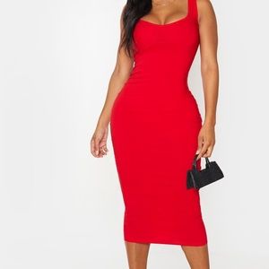 NWT a sexy red dress from prettylittlething. Says size 4 but fits like a 2.